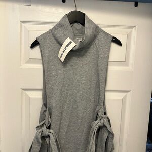 Brand new Irregular Exposure open sides with tie  top. regal-turtleneck gray